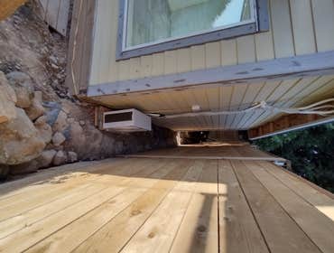Photos by Stewart & Son Gate & Fence LLC #1 Tiny House with pergola. Small house 17' by 12' small bathroom with pocket door, and small sink with water 
