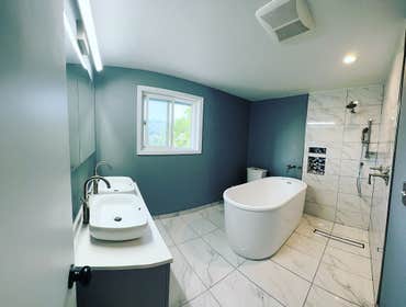 Bathroom restoration We restored this existing bathroom to a master bathroom.
Bathroom includes the following features: curbless shower, stand alone ba