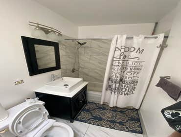 Pullman Bathroom Remodel Bathroom remodel including new tile, vanity, mirror, lighitng, painting, and repairs.