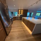 Photos by Dreamhome Buliders and Renvoations Inc #1 We completely transformed the old kitchen by installing custom white oak kitchen cabinets, a new co