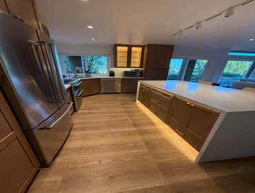 Photos by Dreamhome Buliders and Renvoations Inc #1 We completely transformed the old kitchen by installing custom white oak kitchen cabinets, a new co