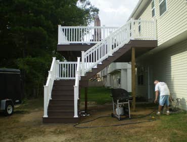 Azek Deck This is a 2nd story deck built with Azek decking and vinyl railing.