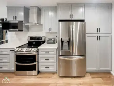 Mar Vista Kitchen Remodel We transformed this Mar Vista kitchen into your modern, functional retreat! Picture light gray cabinets with black handles, s