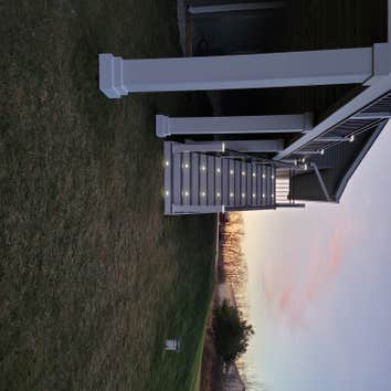 Photos by Define Decks LLC #1 This deck has it all. Helical pile footings, Azek decking, Westbury Riviera railing, Miratec trim and post wraps, and lig