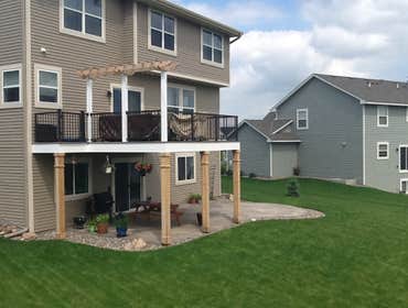 Photos by Custom Home Specialties Inc #2 Timber Tech maintenance free decks with powder coated railings.