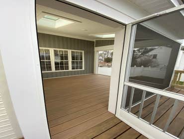 Screen Porch with skylight and Wolf PVC decking