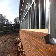 Project in Culpeper VA We constructed the building, installed under ground utilities (water, sewer, storm) and erected the retaining wall. We also...