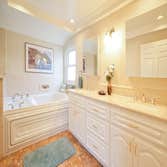 Master Bathroom This bathroom was completely gutted. We installed a large Trajet jetted bathtub, oversized shower, custom vanity, recessed lighting, n