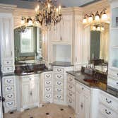 Satterly Project Complete bathroom remodel -- replaced cabinets, put in new tile to replace carpet, installed new four-jet shower, copper-clad sinks an