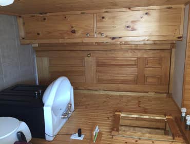 Pine bathroom, sink and mirror