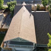 Photos by Sol Vista Roofing #1 We met with and listened to this client and understood they wanted a durable shingle roof to replace their 20+ year old 