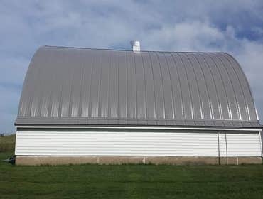 Metal roof round barn