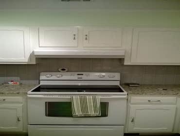 whole house remodel Kitchen remodel, resurfaced cabinets, tile backsplash, new vinyl plank flooring (click together), new custom toe kicks, transition 