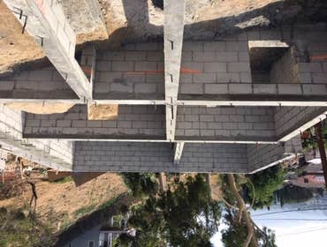Mount Washinton Hillside land development including caissons/piles, grade beams, CMU block walls, retaining walls. All known as foundation and structur