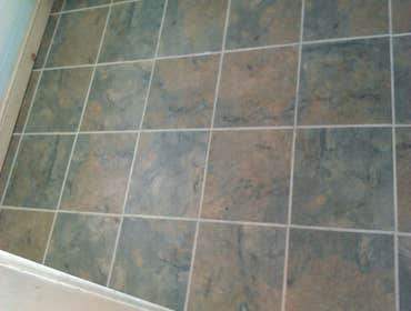 Photo(s) from Laur Moor Construction Two decks and a tiled kitchen floor