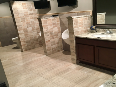 Two urinals and a toliet