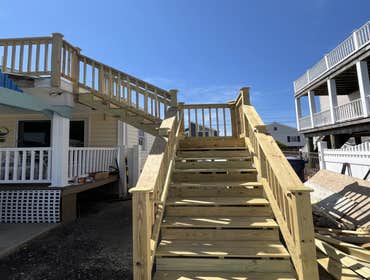 2nd story deck construction with mid level landing to ground