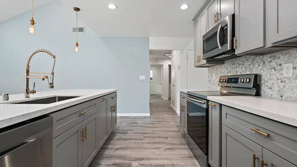 Kitchen Remodel with tile backsplash and new flooring