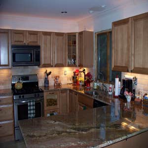 Fineline Construction Group Project Interior remodeling projects, commercial bar, flooring, basement remodel, fencing, hardscaping, and electrical.