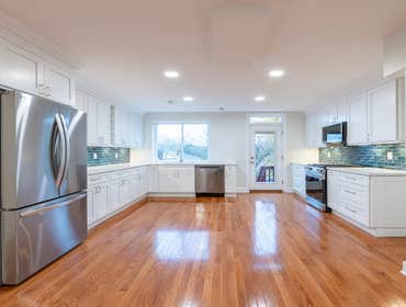 Metallic Green Backsplash Add a pop of personality to your kitchen! We installed a vibrant metallic green backsplash to add a touch of personality to t