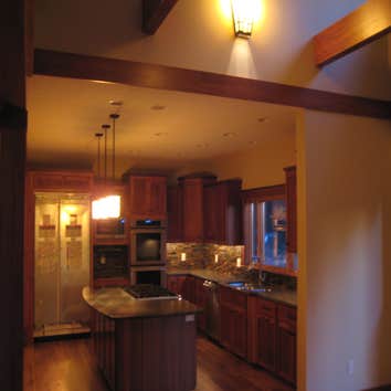 Electrical Solutions WI LLC Kitchen that is missing refrigerator front panels. Master Bathroom sink area
