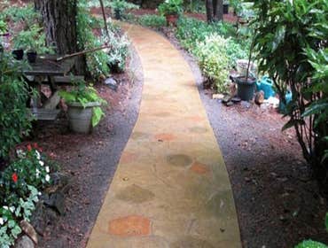Photos by Stamped Concrete Denver LLC #1 Stamped concrete, often called textured or imprinted concrete, replicates the look of many different stones su