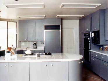 1983: Rounded Wonder Kitchen In this La Jolla home we did major structural alterations to turn the area of an unused study into a family room open to t