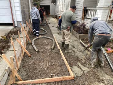 Photos by NW Regal Construction LLC #1 Driveway, retaining wall, and city sidwalk