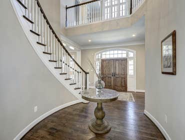 GULICK | CUSTOM Home in McLean The impressive stone and HardiePlank® elevation on our Winthrop really stood out on this corner lot of approximately one