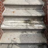Concrete step Repair Broken and falling apart concrete steps. Cleaned out steps filled and troweled with new concrete/cement