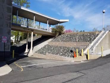 Photos by Margarella Industrial Con #1 Before and After of a Newly Installed Retainer Wall