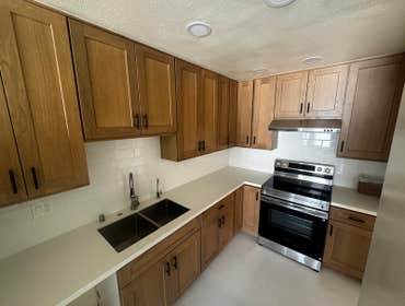 Complete Apartment Remodel Monterey Park CA Full apartment renovation including new flooring throughout, a reconfigured kitchen layout, conversion from