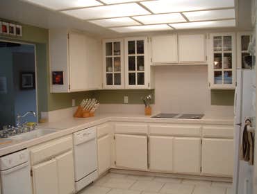 Cypress Kitchen Remodel This project required removing a load bearing and shear wall. The outcome was magnificent. The before pictures are included.