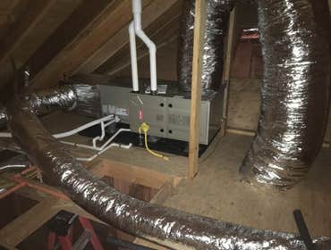 Photos by All Weather Heating and Air Conditioning Two complete HVAC systems including ducting, to be installed in two phases; pictures shown are from 