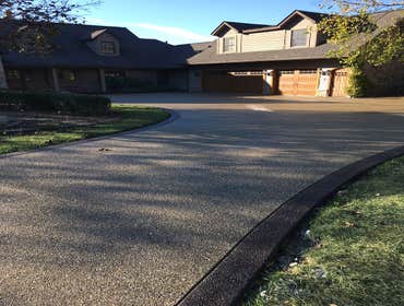 exposed aggregate Driveway Photo by Potoroka Concrete Macomb MI