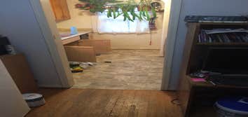 Small Kitchen Small kitchen remodel - replace cabinet, counter tops, sub-flooring and vinyl flooring.