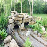 Outdoor Waterfall With Trains Work in progress. We specialize in custom work.