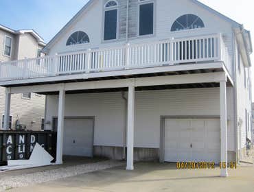 Photos by Saviors Custom Carpentry, Inc #1 Composite steps, vinyl railings & 1x4 azek