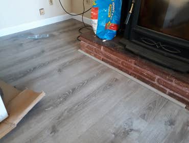 Photos by JC Contracting #1 NEW LAMINATE FLOOR