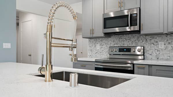 Modern sink and faucet and multicolor tile backsplash