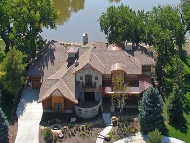 Photos by Elite Roofing Services LLC Replacement due to hail damage. Shake Shingles and Metal Roofing