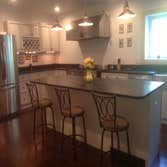 Coastal Ivory Kitchen Cabinet Project We used Coastal Ivory kitchen cabinets for this kitchen make over. The project consisted of a new LG fridge and d