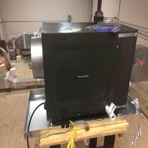 Photos by Climatetron Inc #1 Installation of a Dehumidifier for a server room at Cotulla Independent School District
