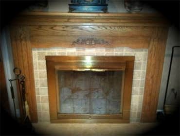 Original Fire Place Design Saved Existing Mantle, and Refurbished old brick face with Tumble Stone.