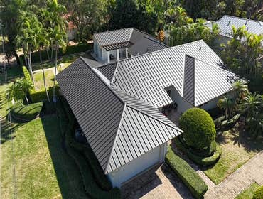 Photos by Gold Star Miami Corp #1 metal roof panels all are . 25 years warrantee