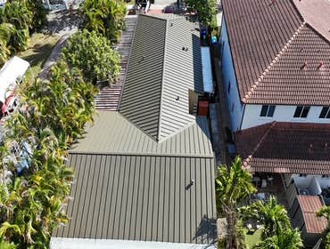 Photos by Gold Star Miami Corp #1 metal roof panels all are . 25 years warrantee