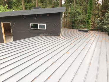 Metal Roofing New Custom home in Bellevue, WA