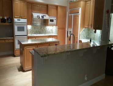 kitchen counter top replacing old kitchen counter top til with new granite.