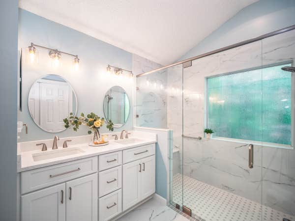 Luxury Bathroom Renovation – Double Vanity & Marble Tile Shower