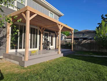 Attached wood pergola